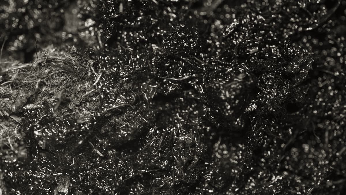 Dark granular aquarium soil substrate