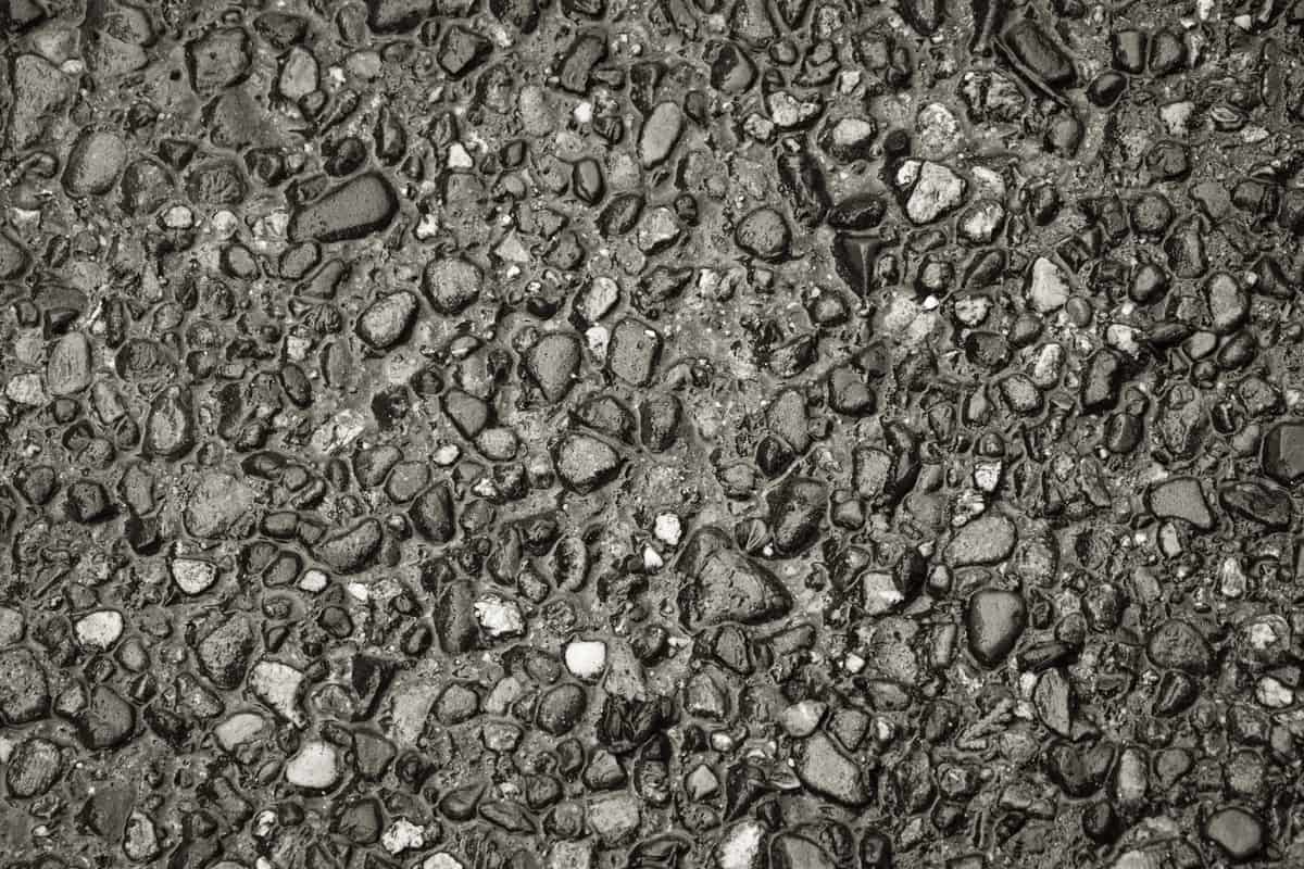 Close-up of dark aquarium substrate grains